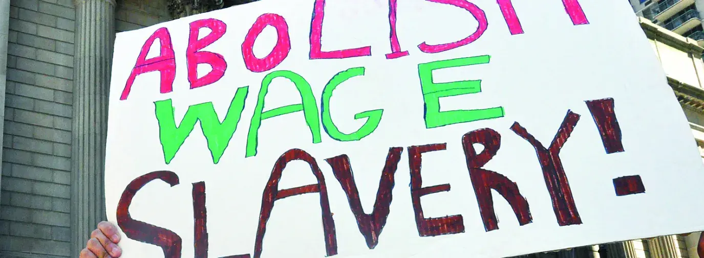 Workers marching on May day 2013 in New York city